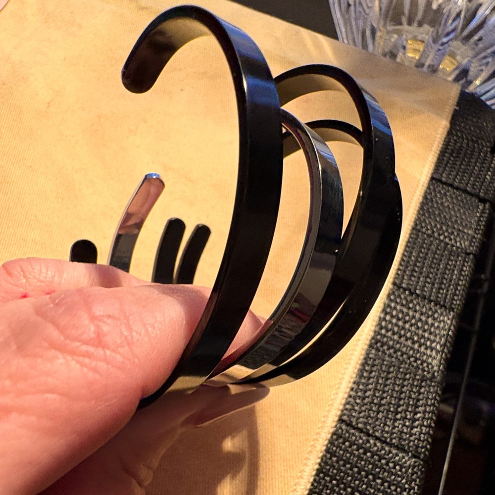 2 black bracelets not engraved yet.